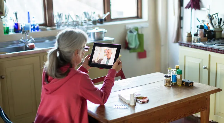 A telehealth visit via tablet. Photo: Alistair Berg/Getty Images