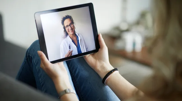 A telehealth consultation via handheld screen
