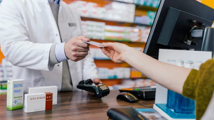 Purchasing over-the-counter drugs with a discount card.