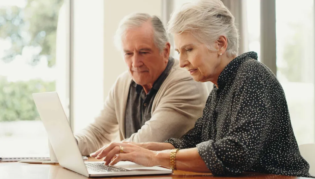 Senior couple searching for a Medicare plan Senior couple searching for a Medicare plan
