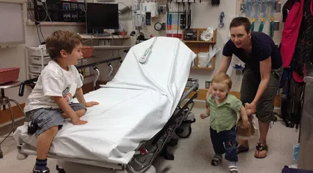 children with mother in hospital room, image from flickr