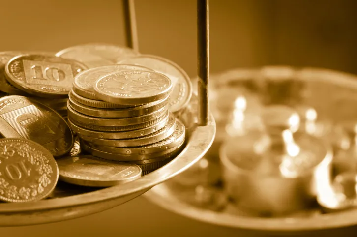 coins on a scale