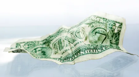 crumpled dollar bill