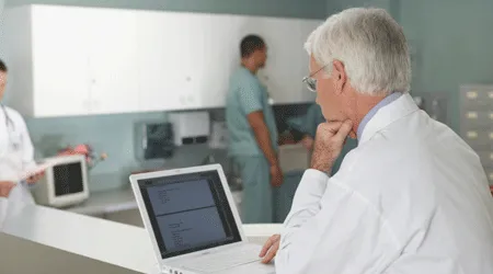 doctor on computer