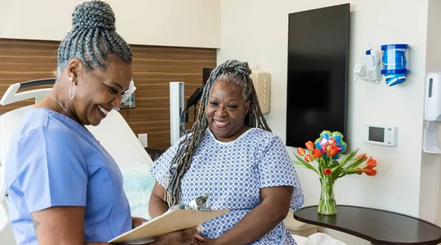 Nurse consulting with patient