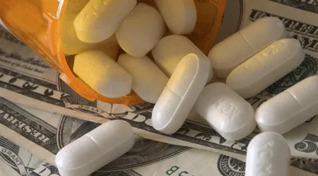 Prescription pills on top of money
