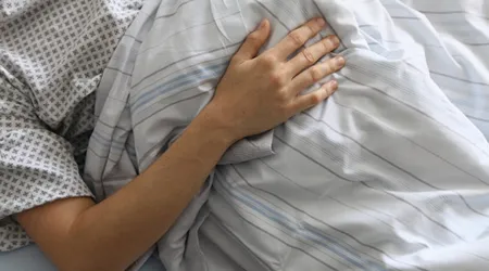 sick patient in bed