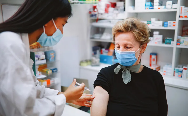Woman getting a vaccine