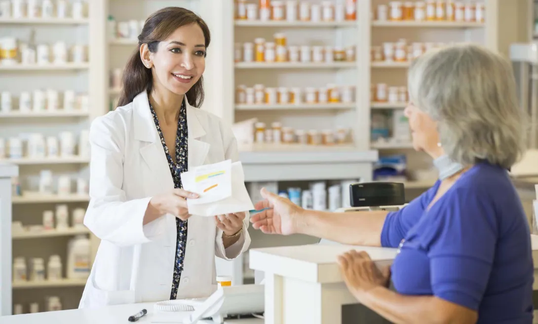 Pharmacist with customer