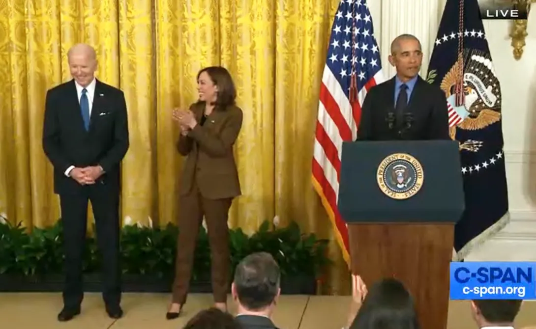 President Biden, VP Harris, and President Obama, at podium. Photo: C-Span