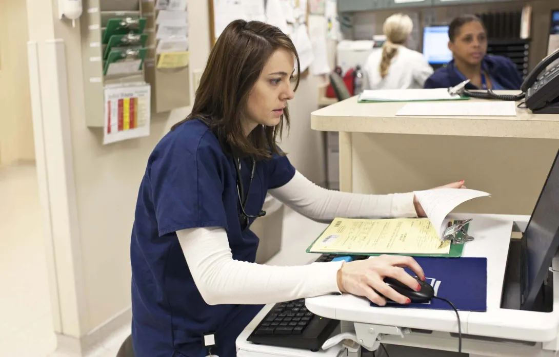Health professionals at work in cubicles. Photo: Reza Estakhrian/Getty Images