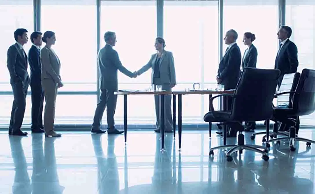 Execs shaking hands
