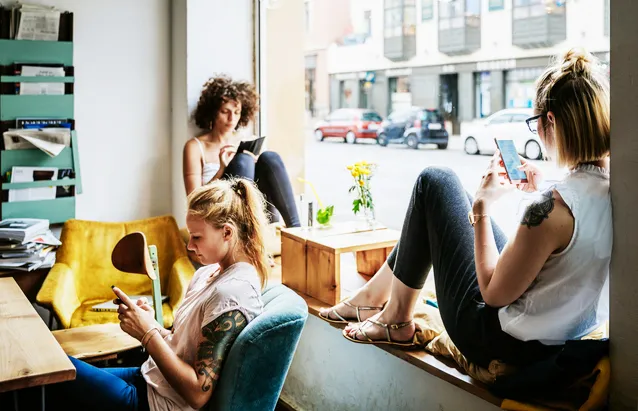 People on phones together