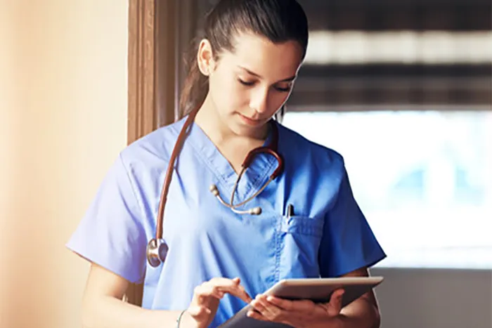 Healthcare worker with tablet