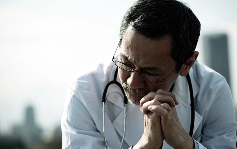 Doctor looking concerned