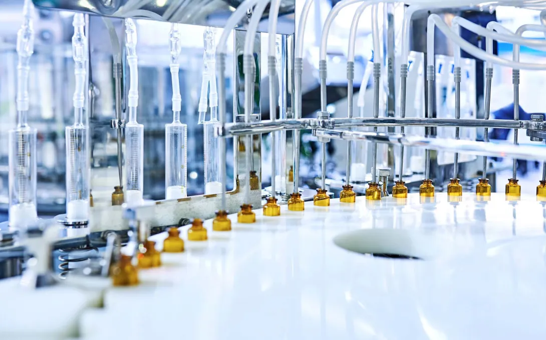 Factory lab with bottles being filled