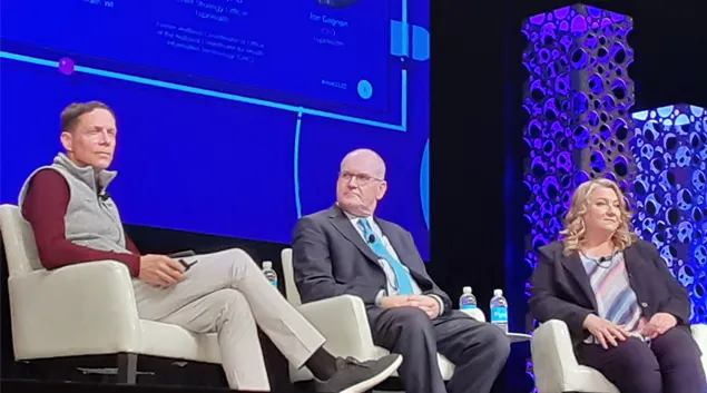 The panel on stage at HIMSS22