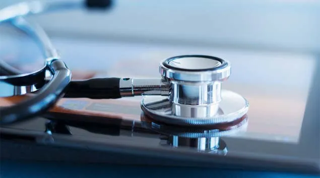 Stethoscope resting on a tablet
