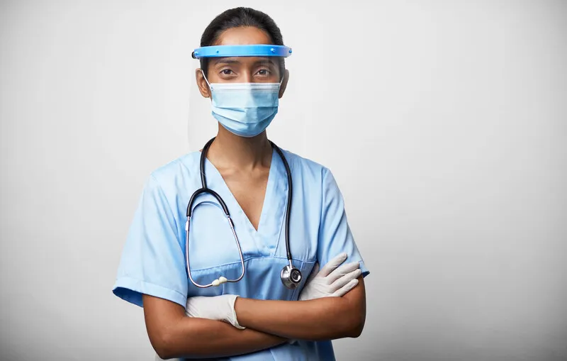A medical professional in PPE