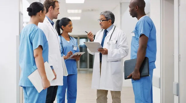 Group of healthcare workers talking