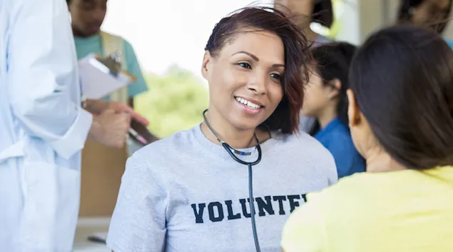 Healthcare worker volunteering in their community