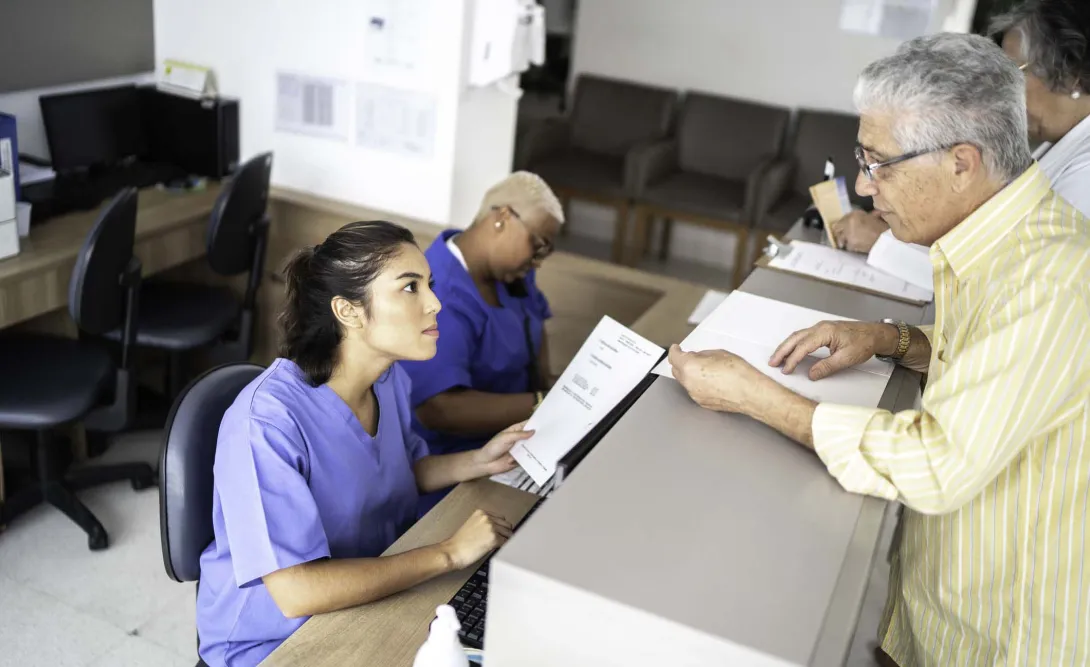 Patient asks receptionist for his medical records.