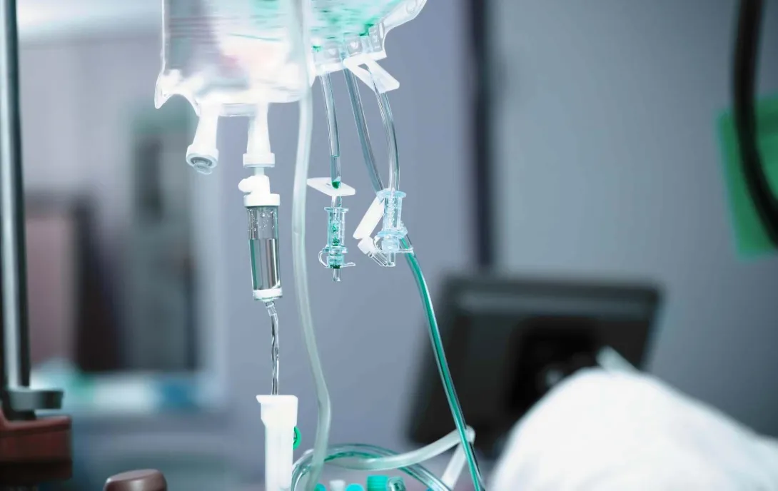 IV drip bag in hospital room