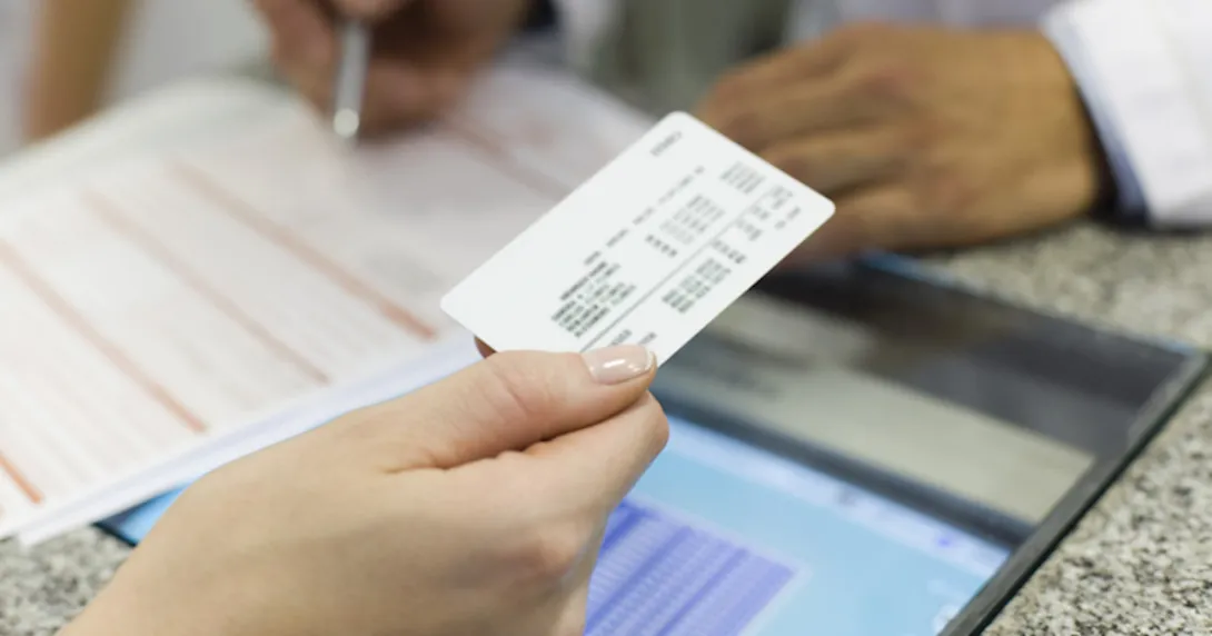 Person presenting insurance card