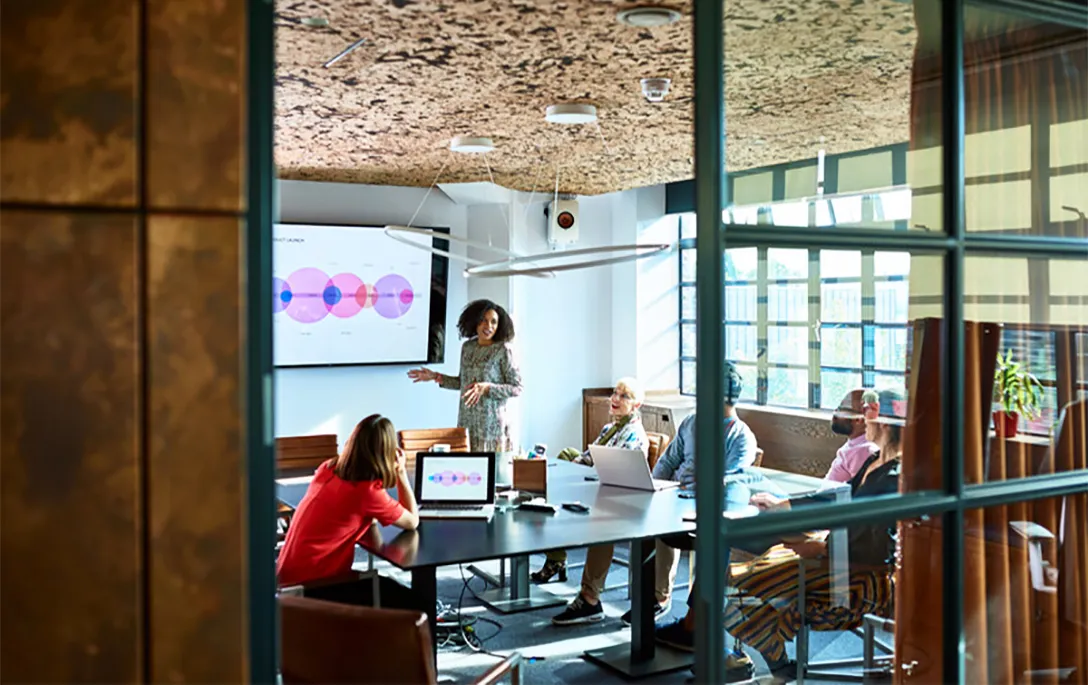 A business presentation in a conference room. Photo: 10,000Hours/Getty Images