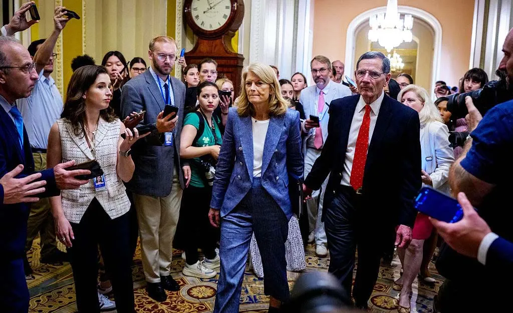 Sen. Lisa Murkowski (R-AK) and Sen. John Barrasso (R-WY) in the Capitol after the Senate vote-a-rama on July 1.