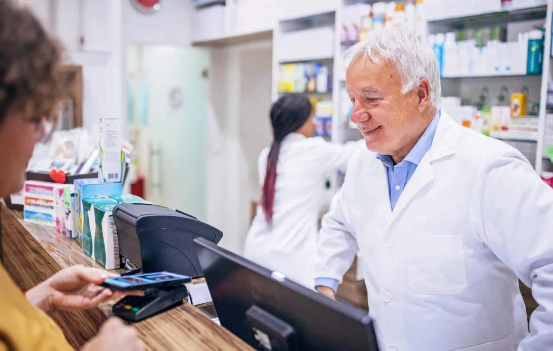 Pharmacist helps a customer