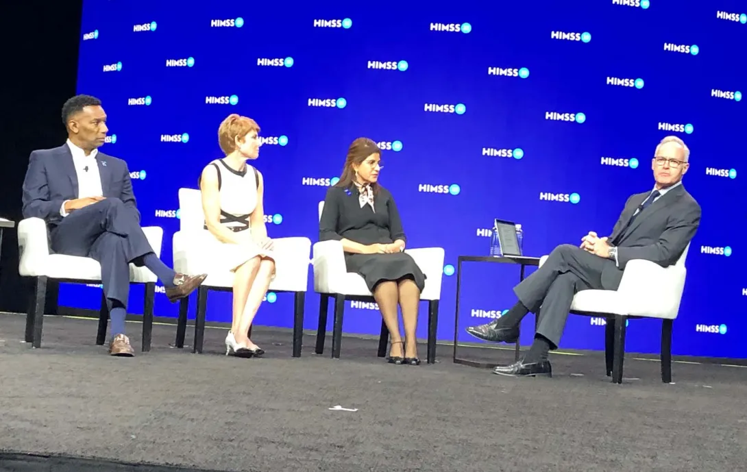 Pelley and the panel members seated on stage. Photo: Susan Morse/HFN