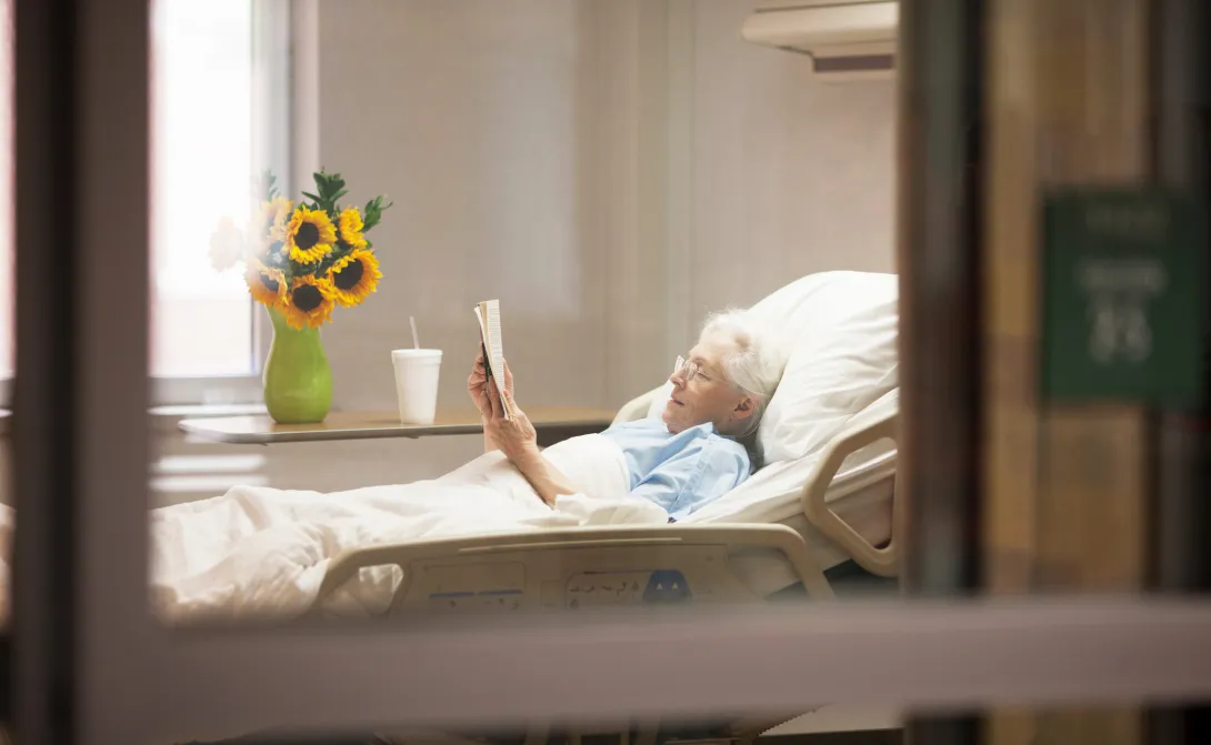Patient in a hospital bed at home.