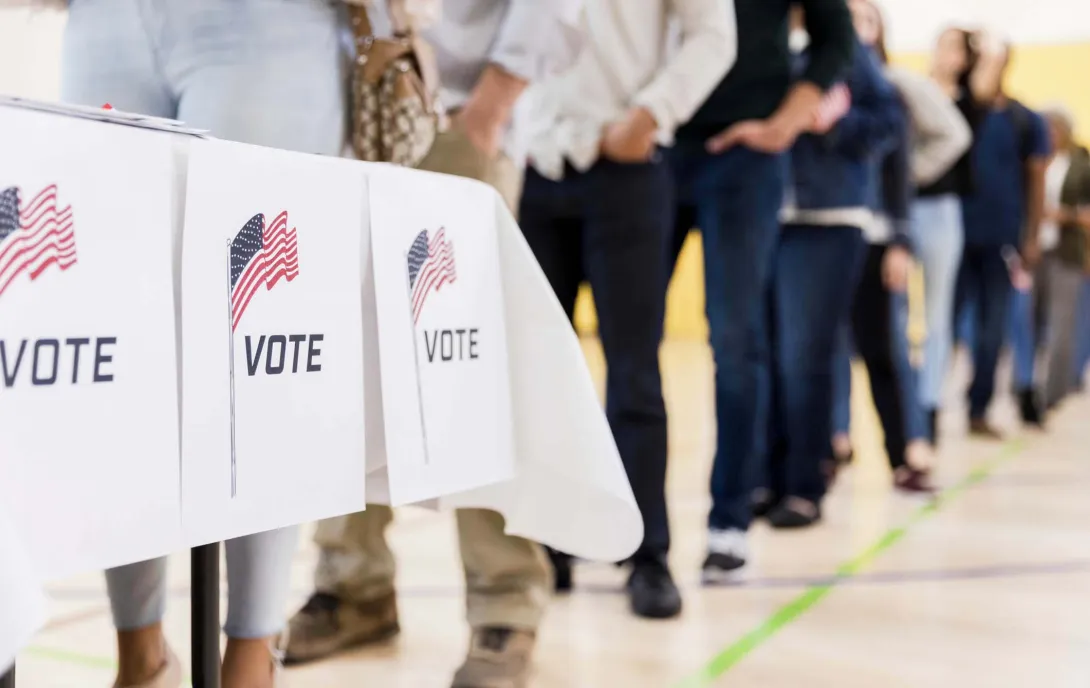 Voters stand in line