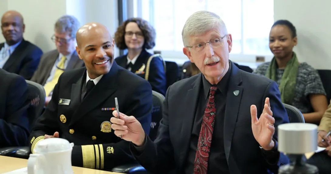 Former Surgeon General Dr. Jerome Adams (L) and Dr. Francis Collins (R)