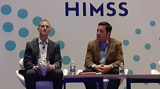 Matthew Fisher and Oliver Kim on stage at the HIMSS23 Global Conference in Chicago on Tuesday