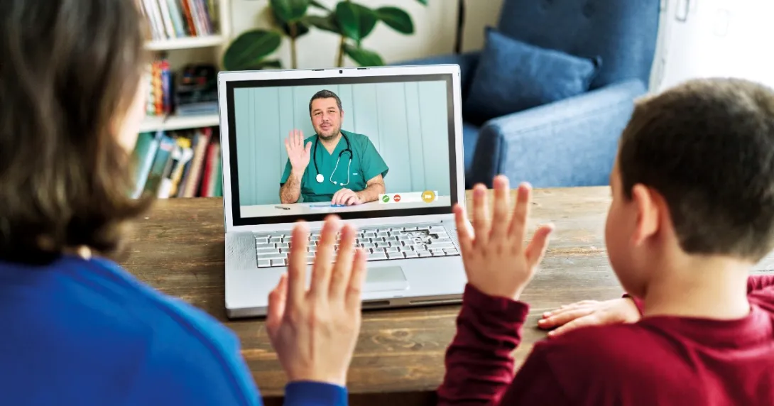Parent and child attending telehealth appointment