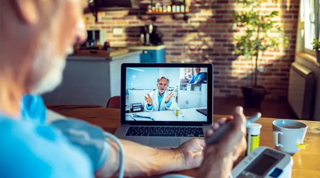 A telehealth visit via laptop