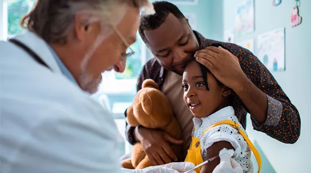 A child receives a vaccination